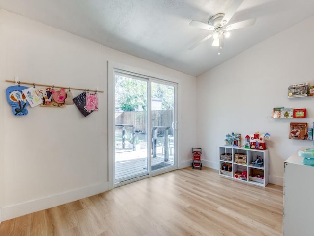 playroom featuring ceiling fan and light wood-type flooring