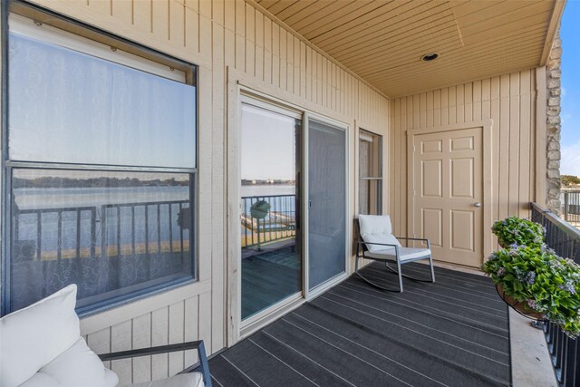 balcony featuring a water view