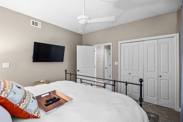 bedroom featuring ceiling fan, a closet, and carpet floors