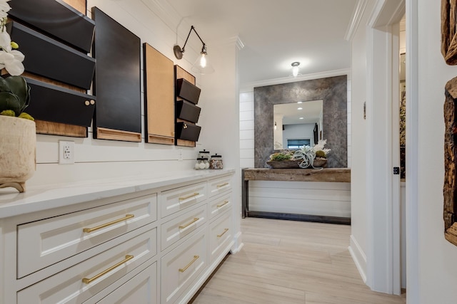 bathroom with vanity and crown molding