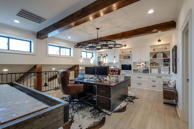 home office with a notable chandelier, beam ceiling, light hardwood / wood-style flooring, and plenty of natural light