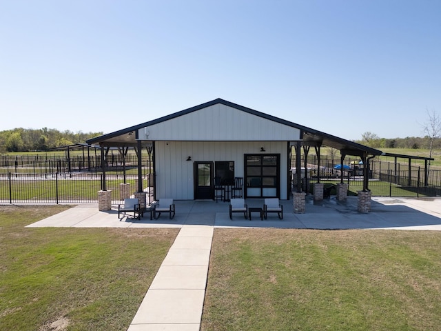 surrounding community featuring a patio area and a lawn