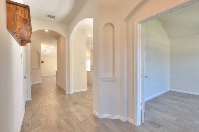 corridor featuring light hardwood / wood-style flooring