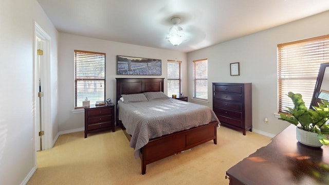 bedroom with light carpet