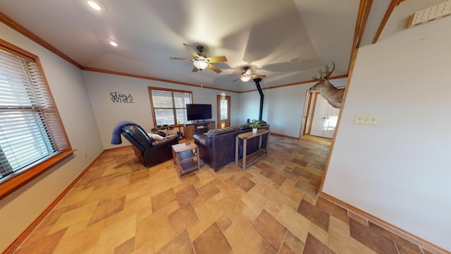 living room featuring lofted ceiling, ceiling fan, and crown molding