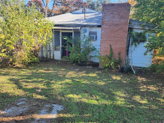 view of home's exterior featuring a lawn