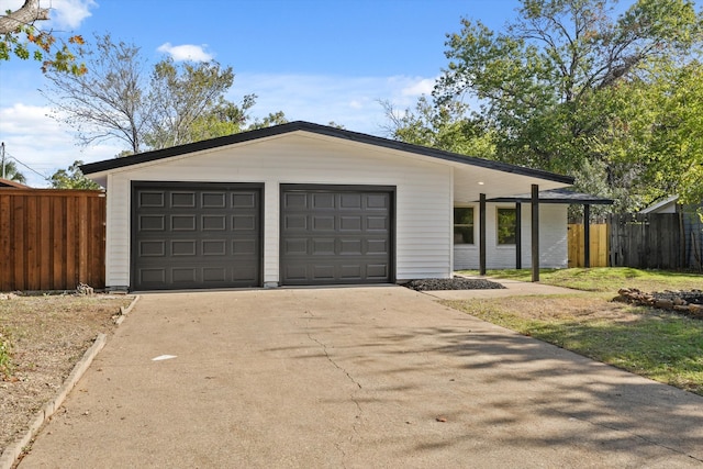 ranch-style home with a garage