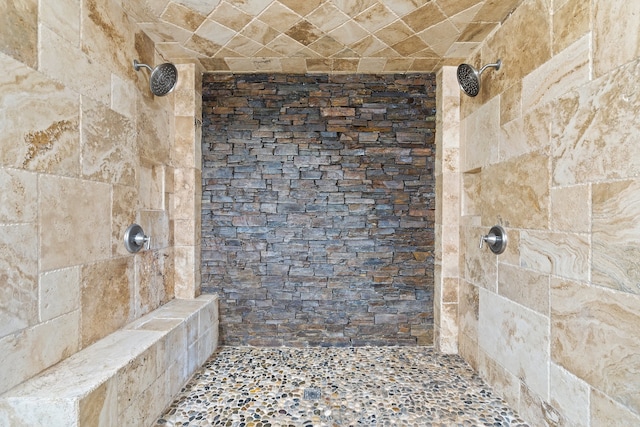 bathroom featuring tiled shower