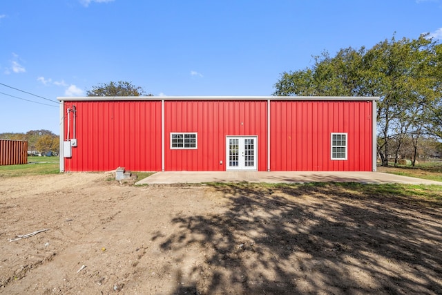 view of outbuilding featuring french doors