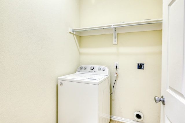 laundry area with washer / dryer