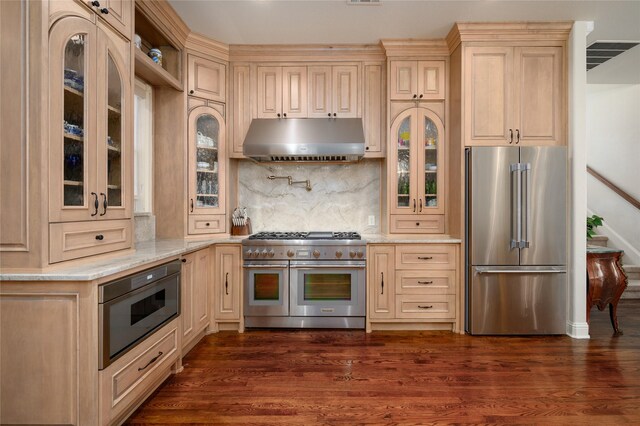 dining area with dark hardwood / wood-style floors and ornamental molding