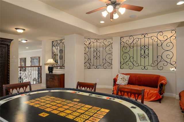 recreation room with carpet and ceiling fan