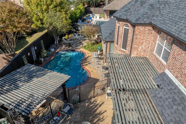 view of patio featuring an outdoor kitchen, grilling area, and ceiling fan