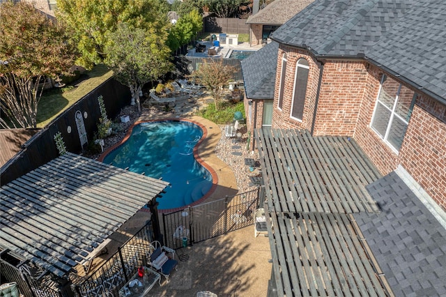 view of pool featuring a patio