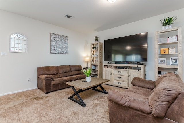 living room featuring light carpet