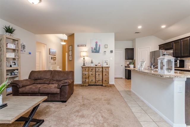 living room with light tile patterned floors