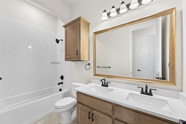 full bathroom with tiled shower / bath combo, toilet, tile patterned floors, and vanity