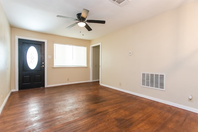 foyer with dark hardwood / wood-style floors and ceiling fan