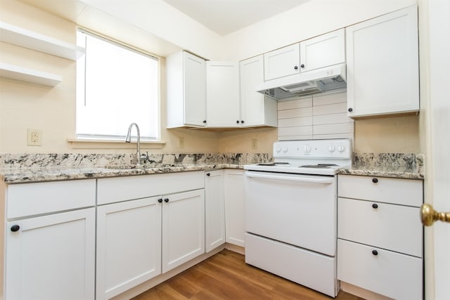 kitchen with light stone countertops, sink, white range with electric cooktop, light hardwood / wood-style floors, and white cabinets