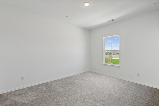 empty room featuring carpet floors