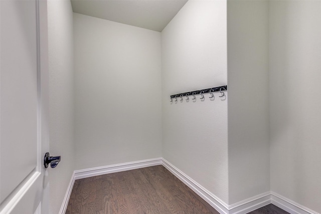 unfurnished room featuring dark hardwood / wood-style flooring