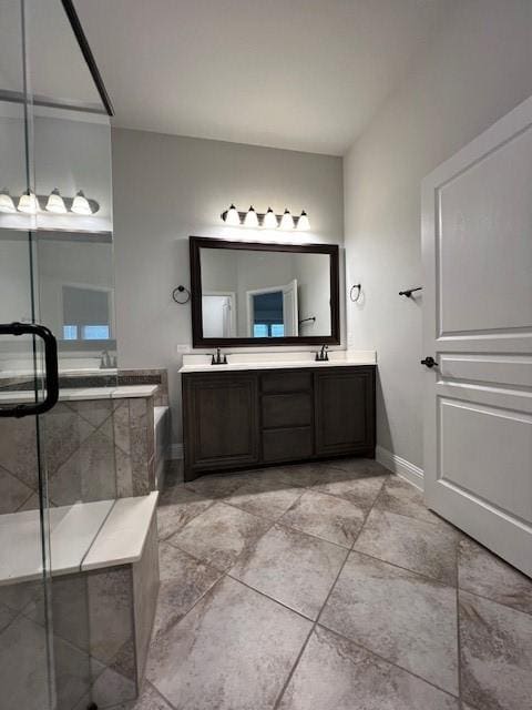 bathroom with vanity and walk in shower