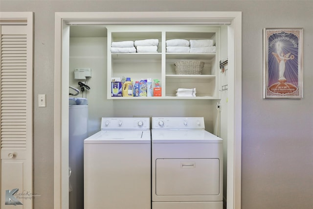 laundry room featuring washer and clothes dryer