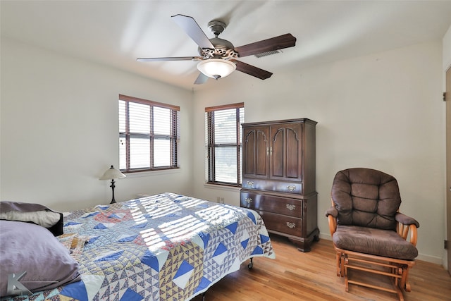 bedroom featuring ceiling fan and light wood-type flooring