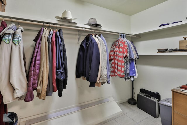 walk in closet featuring light tile patterned floors