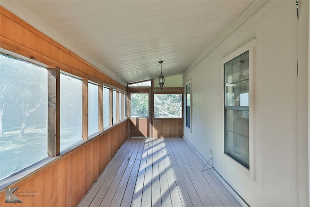 sunroom / solarium with lofted ceiling