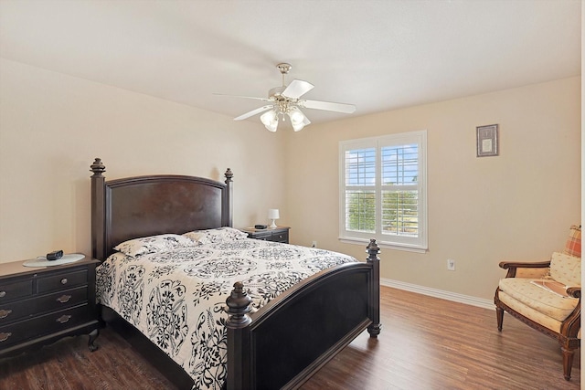 bedroom with wood-type flooring and ceiling fan