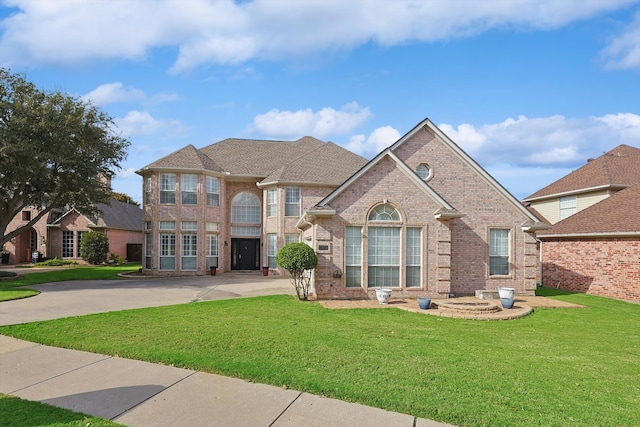 view of front of home with a front yard