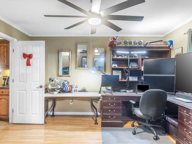 office space with light wood-type flooring, ceiling fan, and ornamental molding