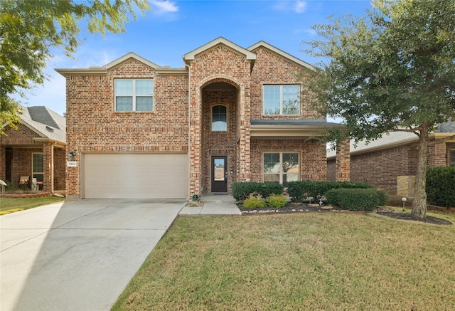 front facade with a garage and a front lawn