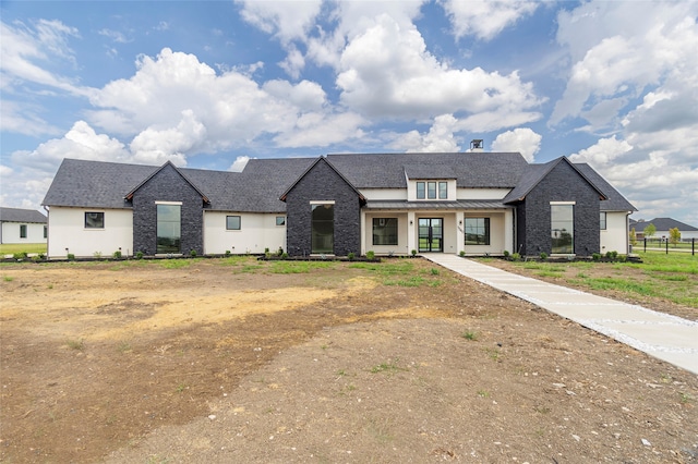 view of french country inspired facade