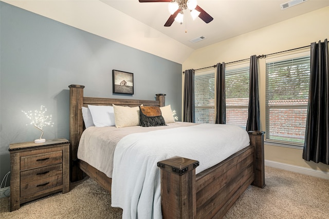 carpeted bedroom with lofted ceiling and ceiling fan