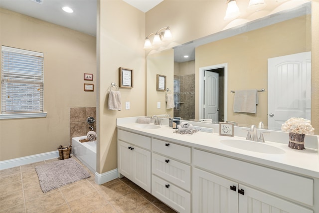 bathroom with independent shower and bath, tile patterned floors, and vanity