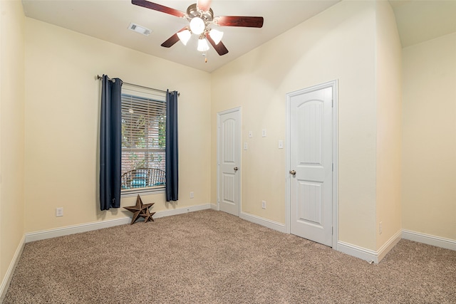 unfurnished room with carpet floors and ceiling fan