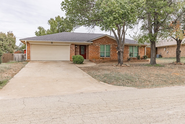 single story home with a garage