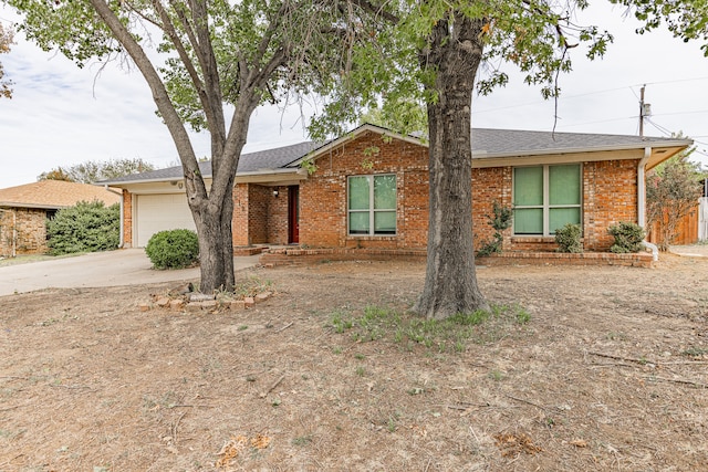 single story home with a garage