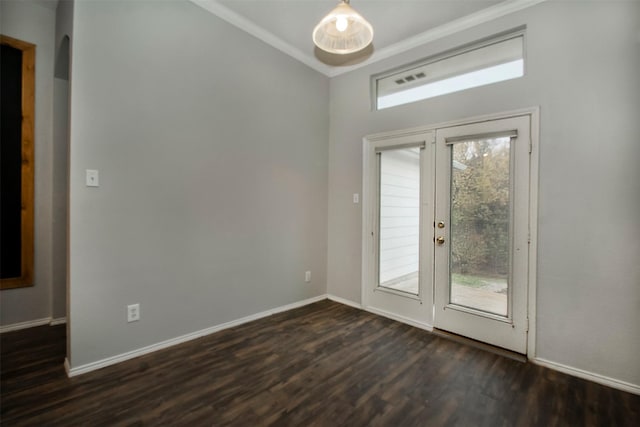 entryway featuring dark hardwood / wood-style flooring and crown molding