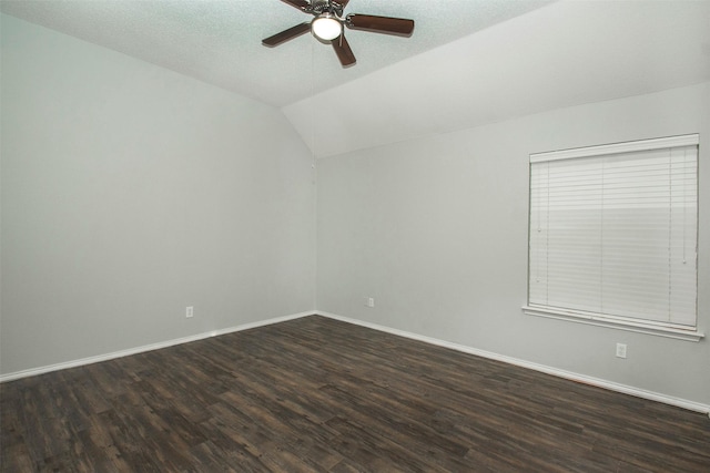 unfurnished room featuring a textured ceiling, dark hardwood / wood-style flooring, ceiling fan, and lofted ceiling