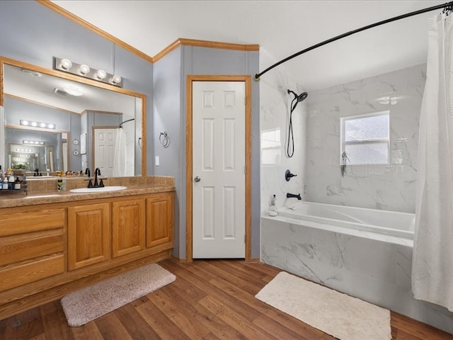 bathroom with vanity, hardwood / wood-style floors, and shower / bathtub combination with curtain