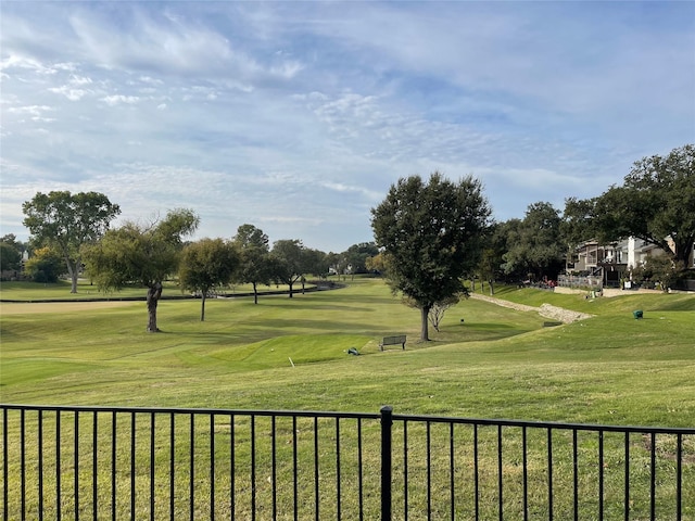 view of home's community with a lawn