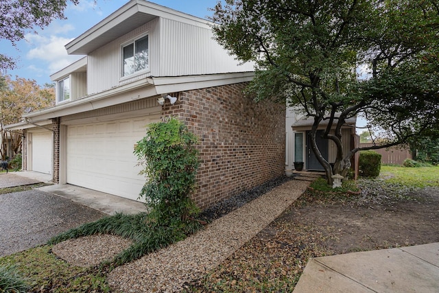 view of side of property featuring a garage