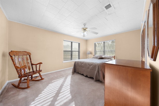 bedroom featuring ceiling fan and light colored carpet