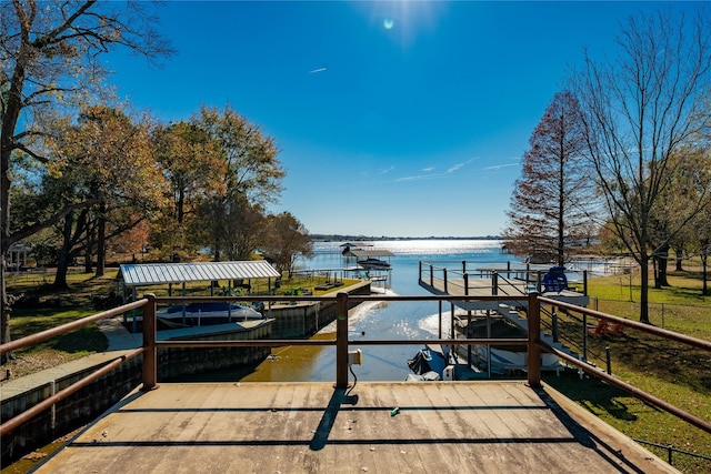 dock area featuring a water view