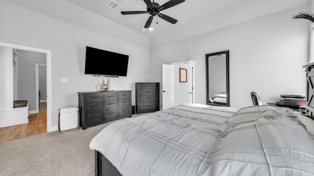 carpeted bedroom with ceiling fan