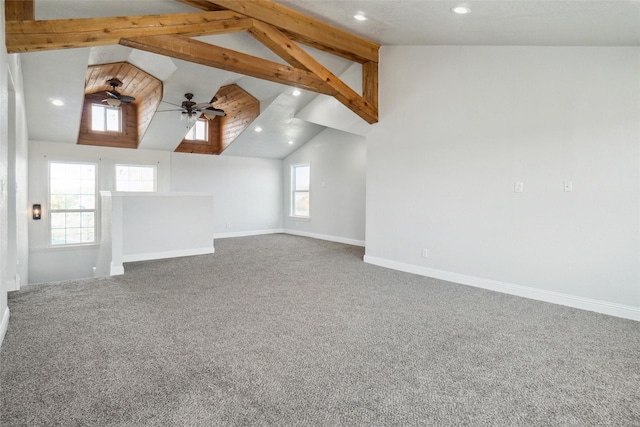 interior space featuring carpet flooring and plenty of natural light