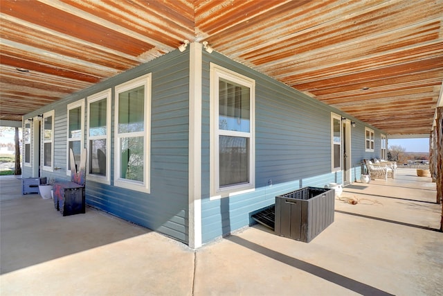 view of home's exterior featuring a patio area